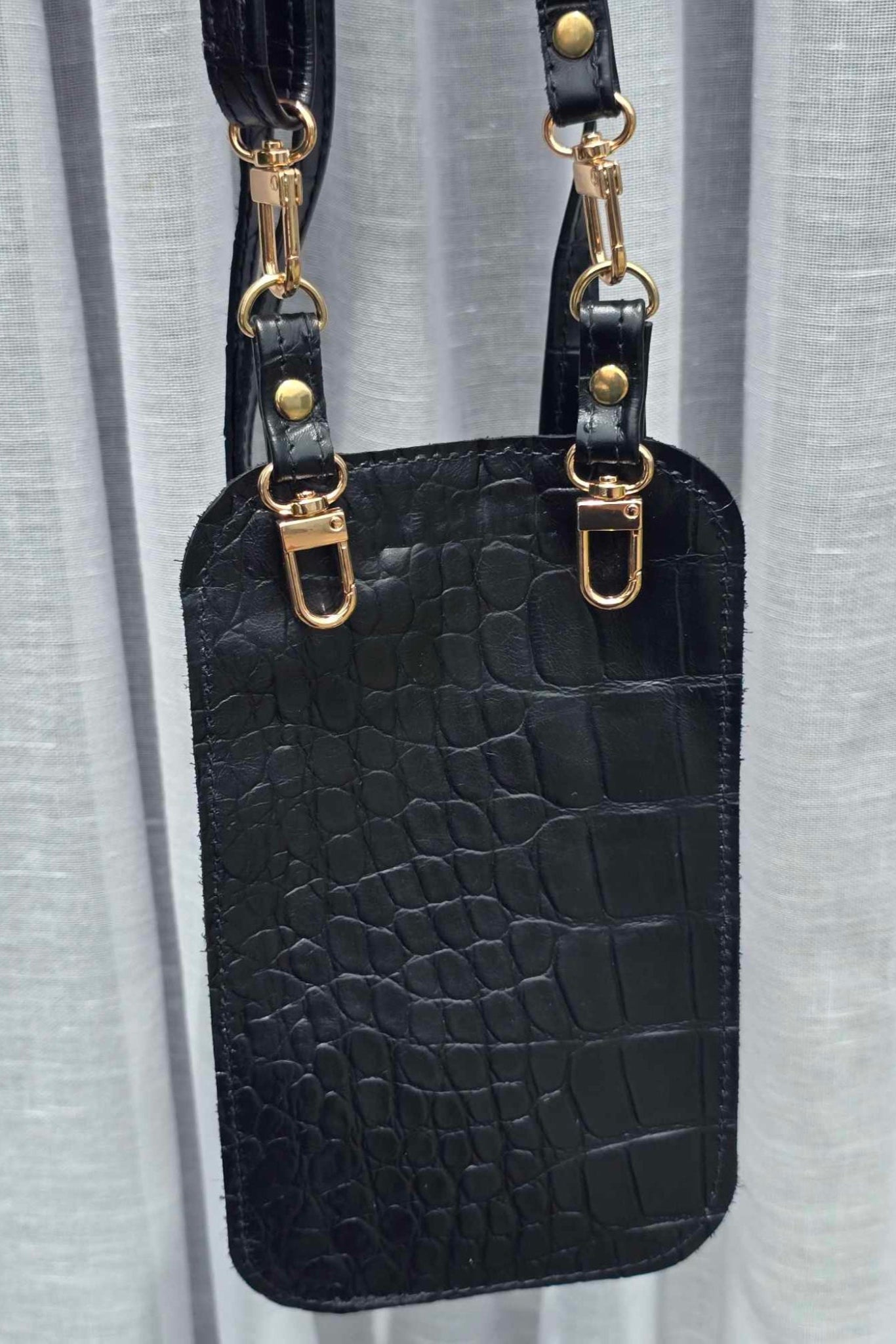 Yena black crocodile imprint leather bag